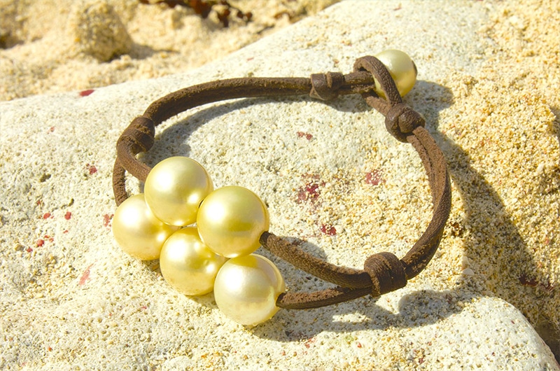 Bracelet 5 perles dorées d'Australie