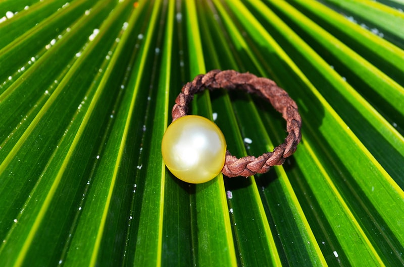 produit: Braided ring with 1 golden Australian pearl - 12mm