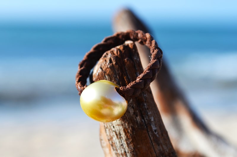 produit: Braided ring with 1 golden Australian pearl - 12mm