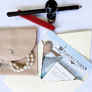 Kalinas & Tainos signature jewelry box with authenticity certificate and care instructions