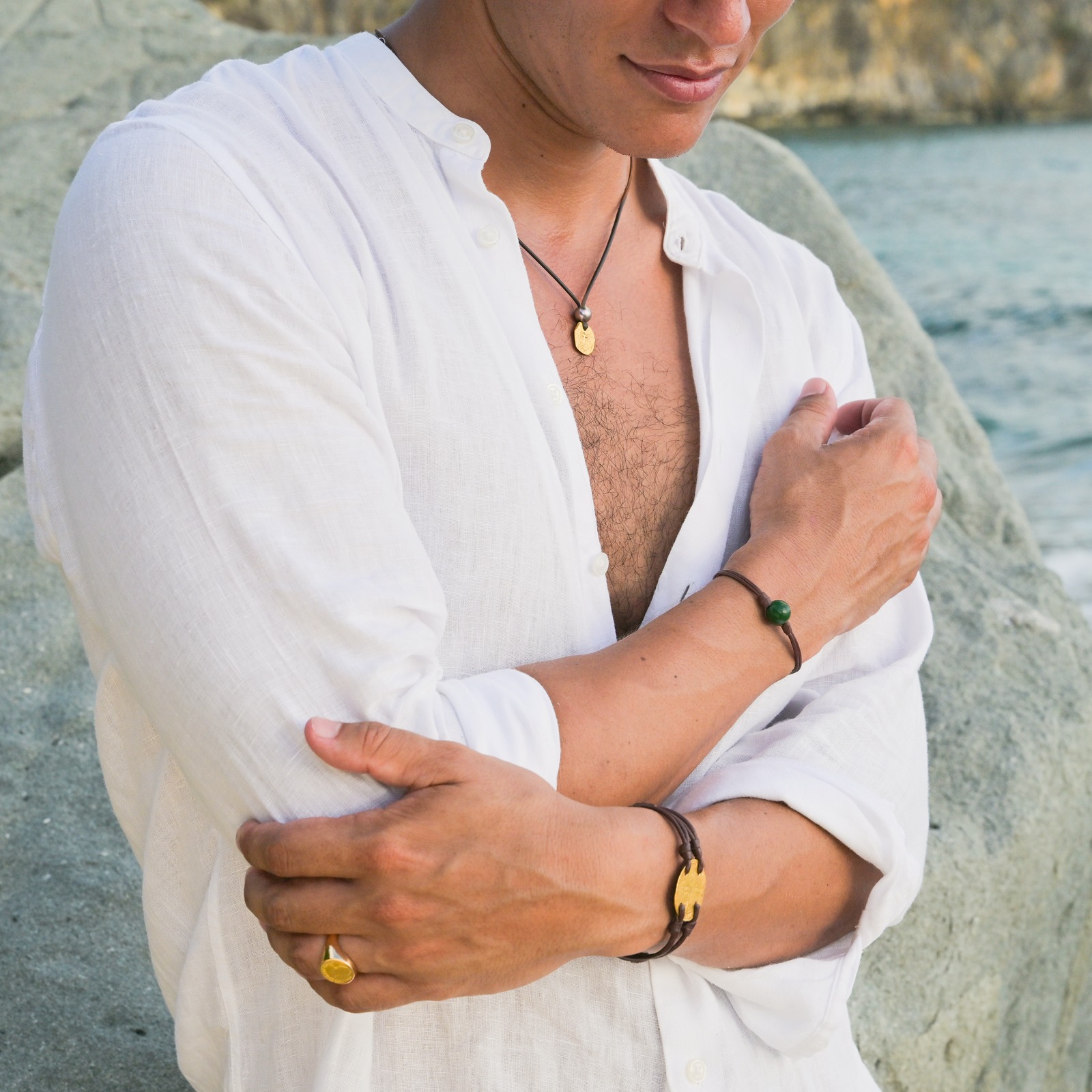 Gold Through the Centuries, an antique escudo necklace with a Tahitian pearl, worn view.