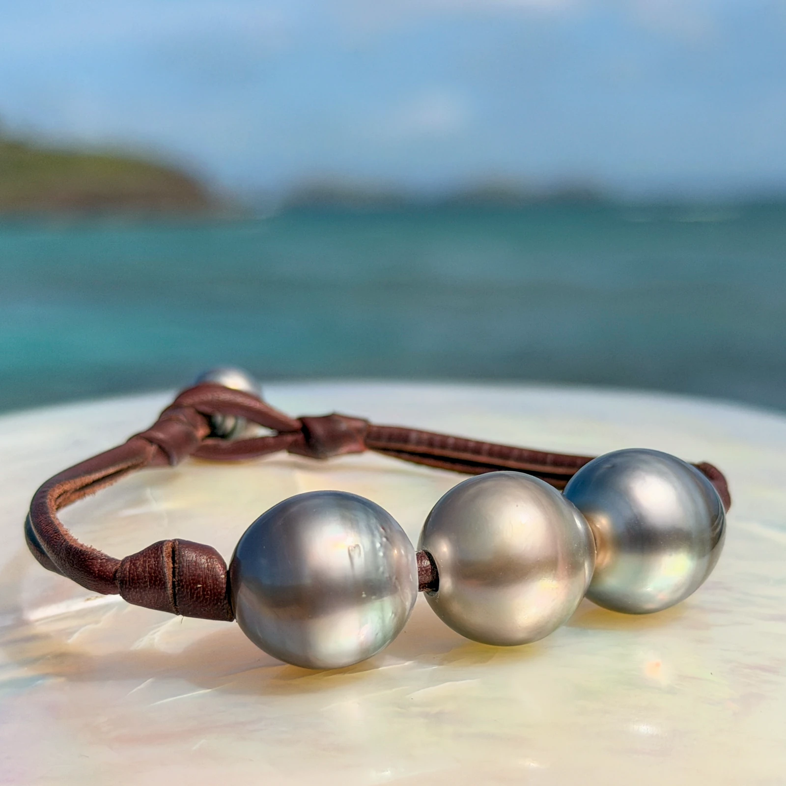 Men’s Leather Bracelet with Three Tahitian Pearls and a Choice of Construction, jewelry view.