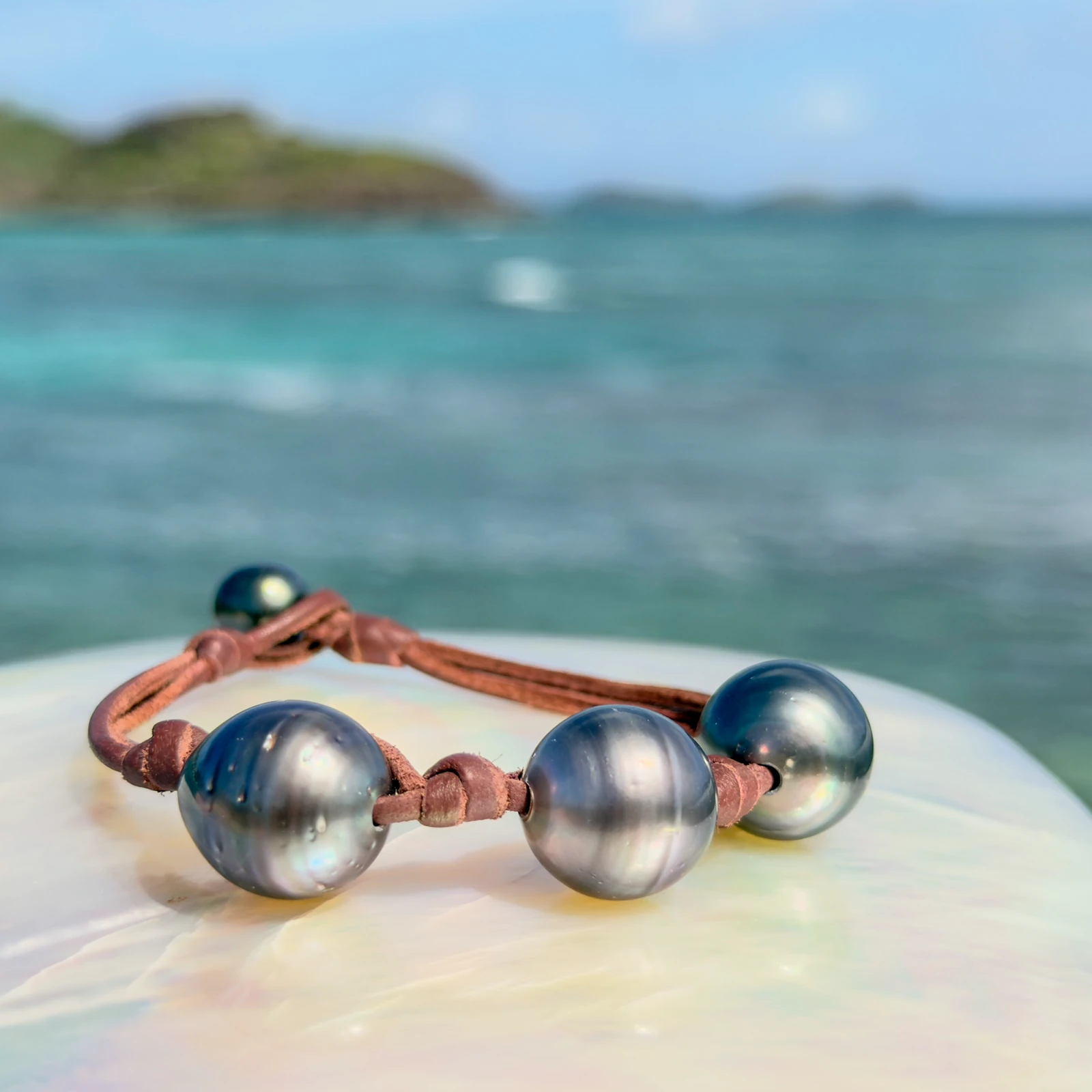 Men’s Leather Bracelet with Three Tahitian Pearls and a Choice of Construction, jewelry view.