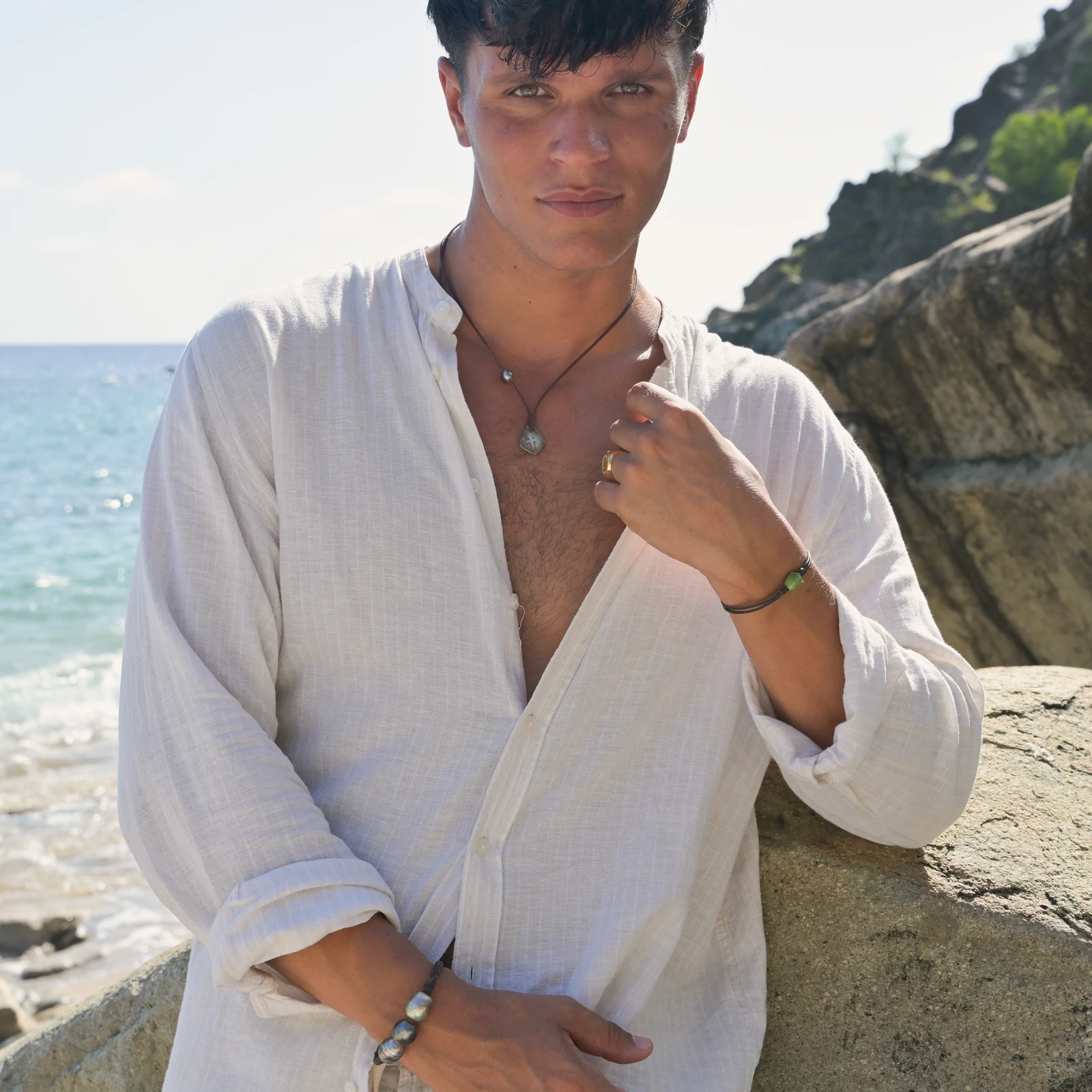 Men’s Leather Bracelet with Three Tahitian Pearls and a Choice of Construction, worn on the wrist.