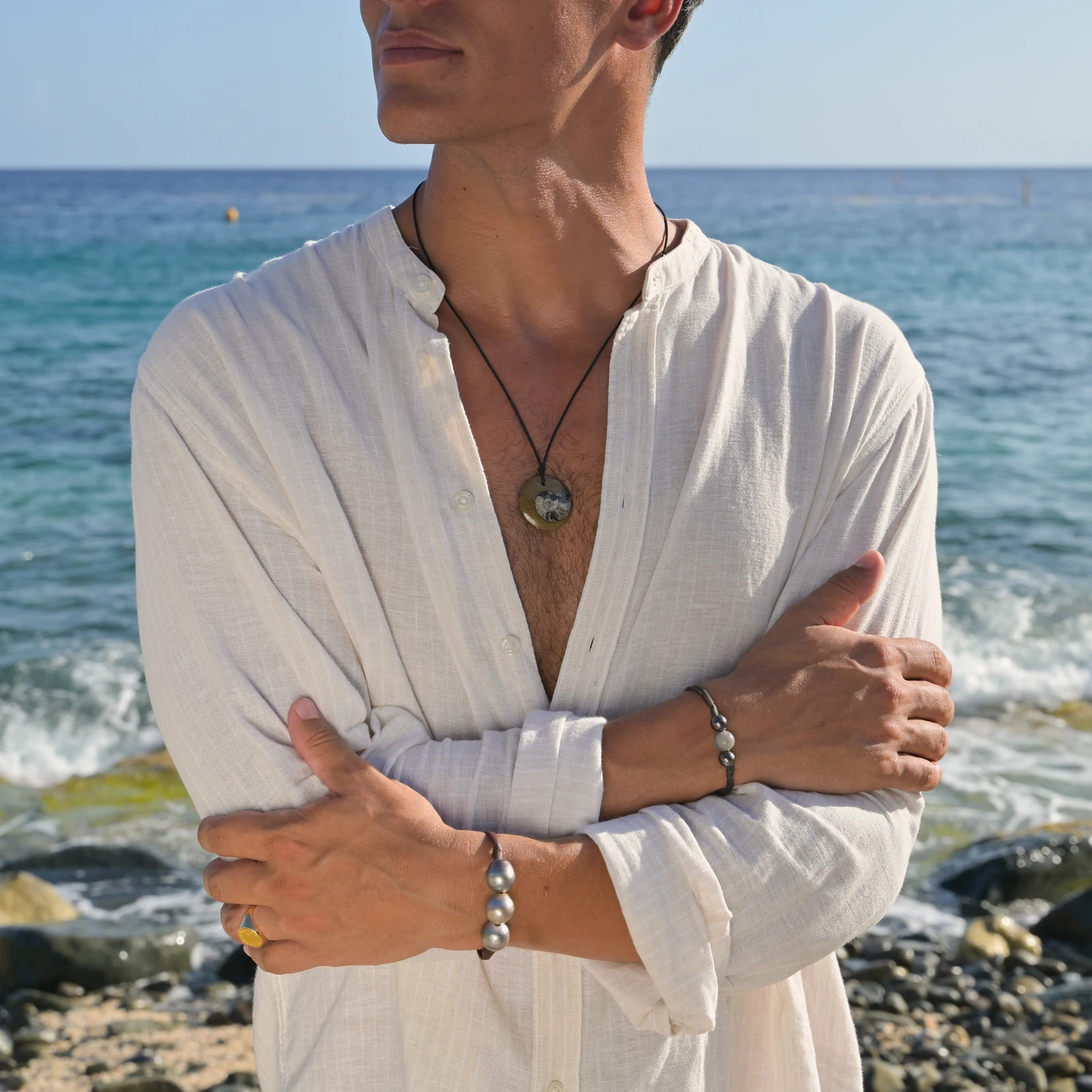 Men’s Leather Bracelet with Three Tahitian Pearls and a Choice of Construction, worn on the wrist.
