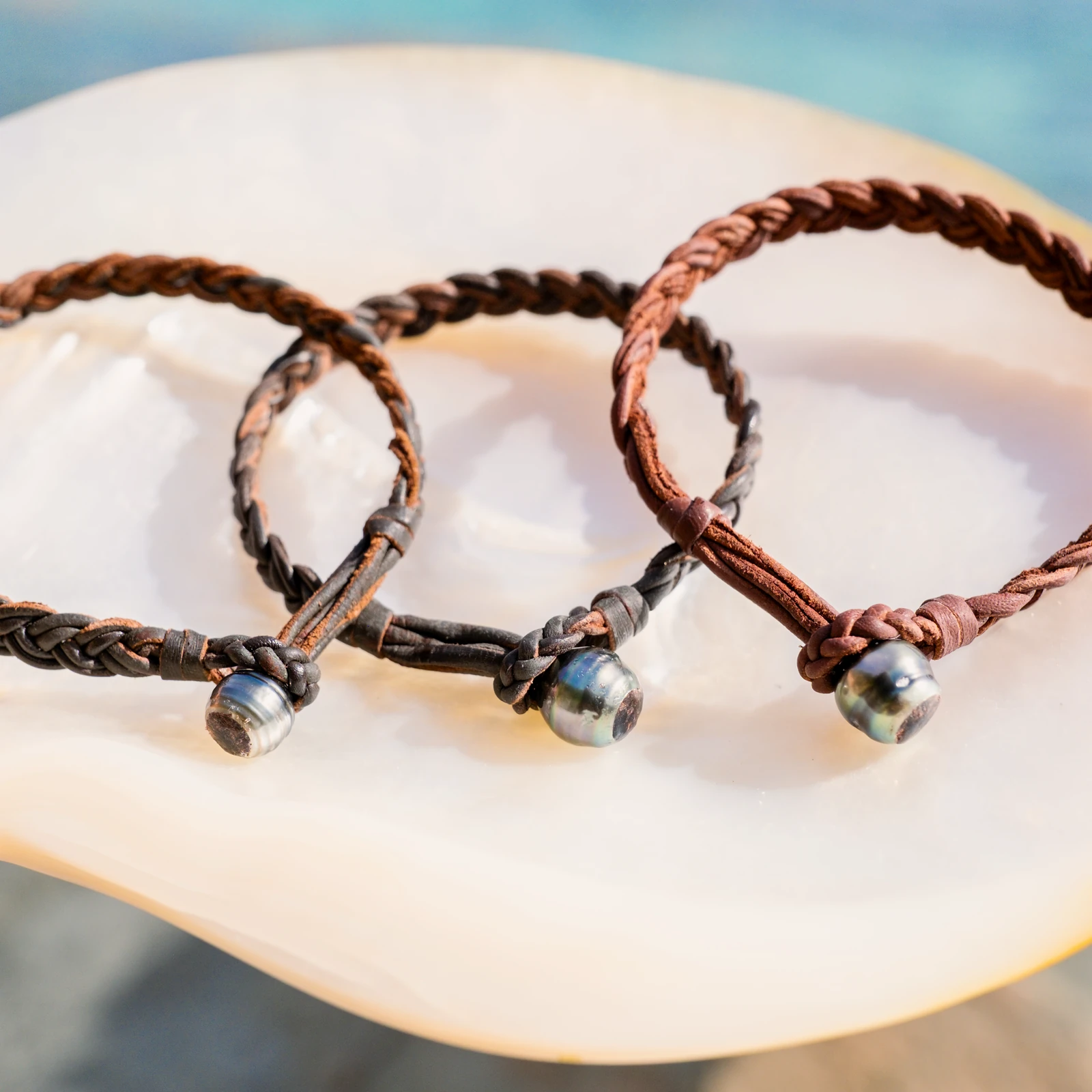 Braided Leather Bracelet with a Tahitian Pearl Clasp, jewelry view.