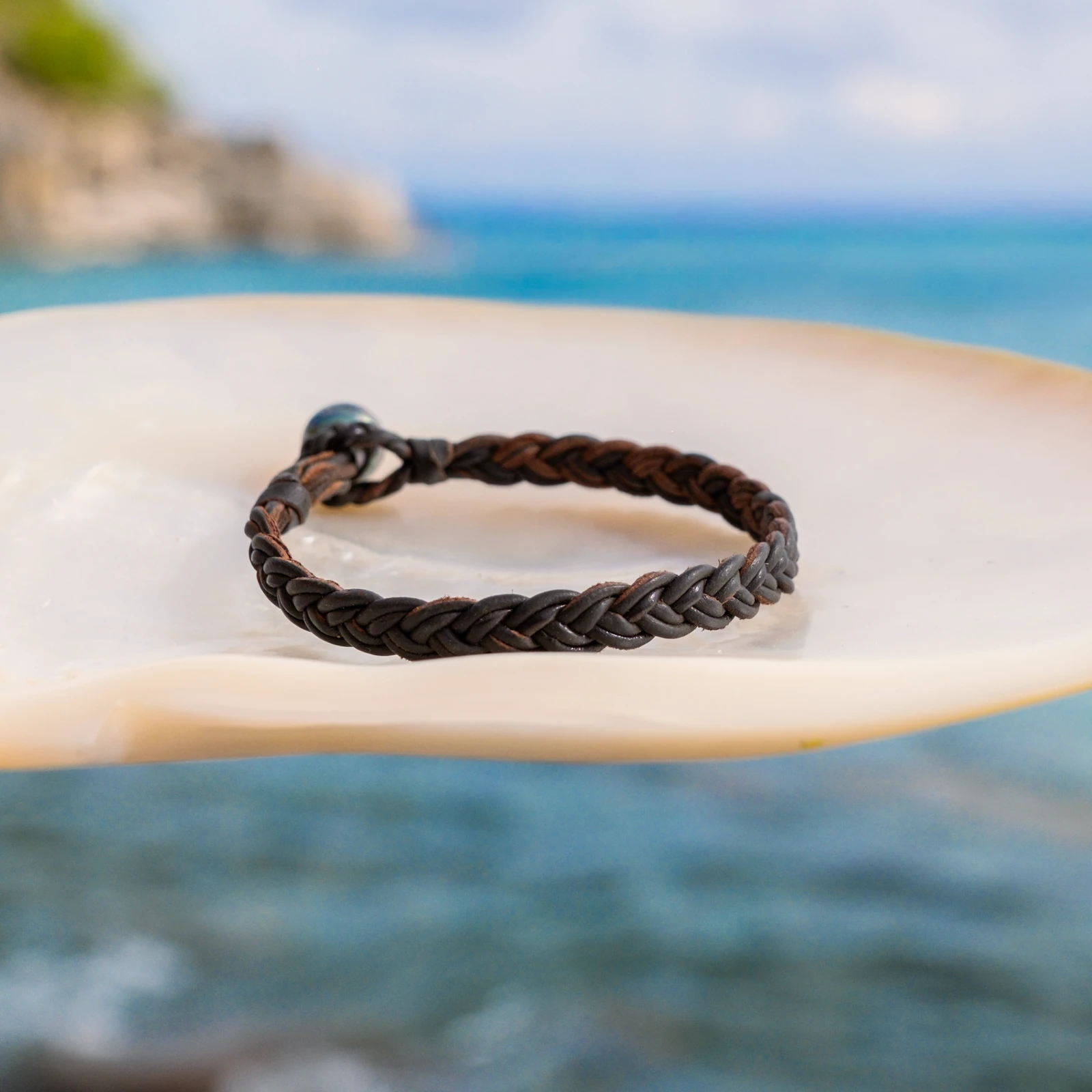Braided Leather Bracelet with a Tahitian Pearl Clasp, jewelry view.