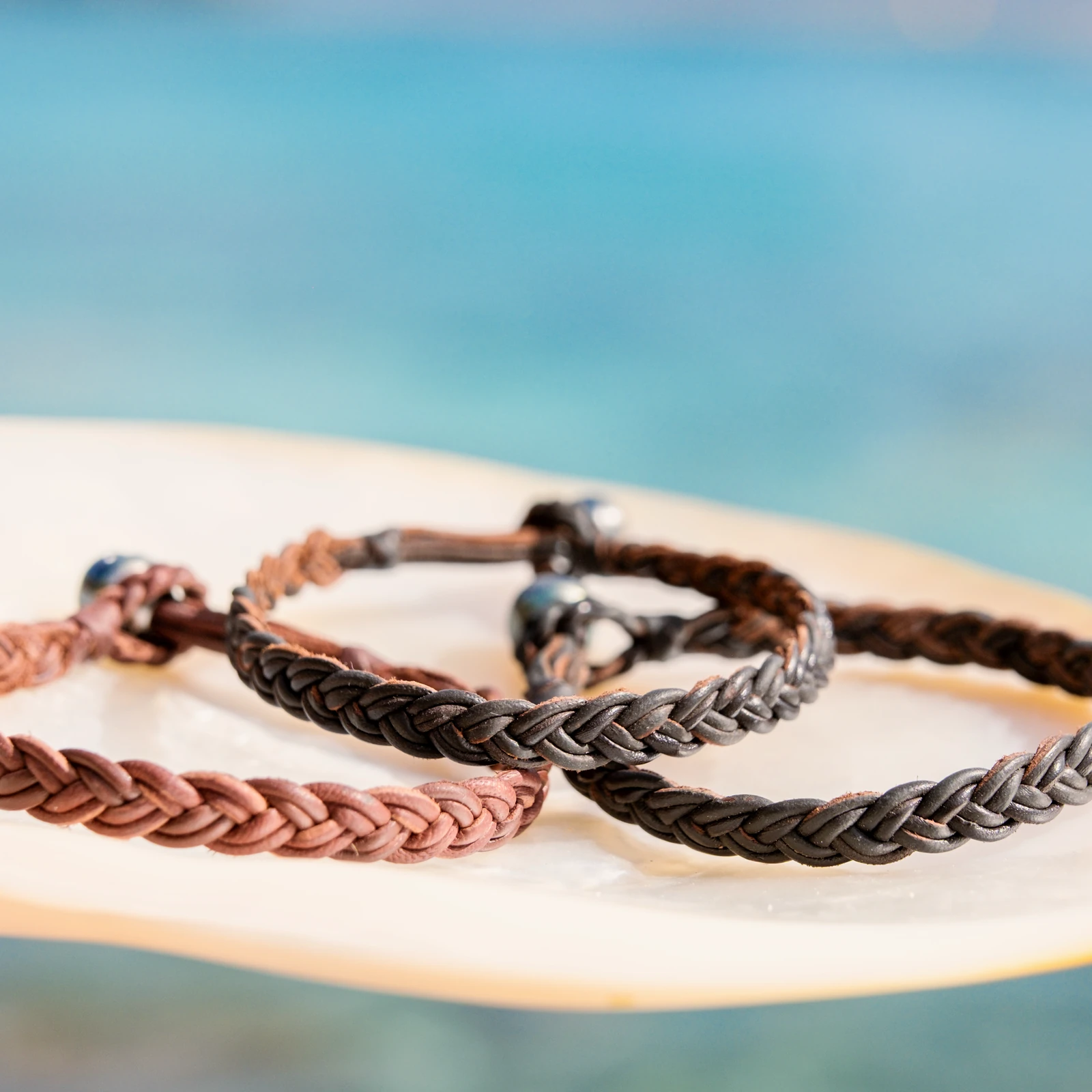 Braided Leather Bracelet with a Tahitian Pearl Clasp, jewelry view.