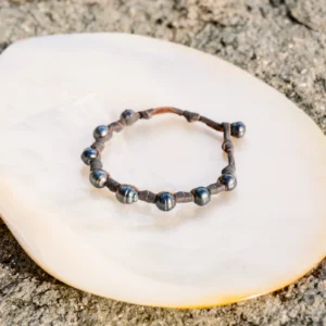 Unisex Leather Bracelet with Tahitian Pearls and Knots, jewelry view.