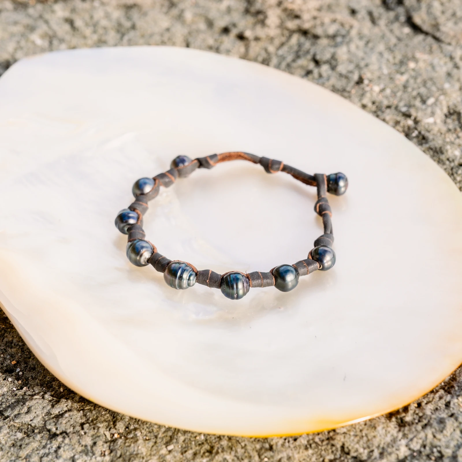 Unisex Leather Bracelet with Tahitian Pearls and Knots, jewelry view.
