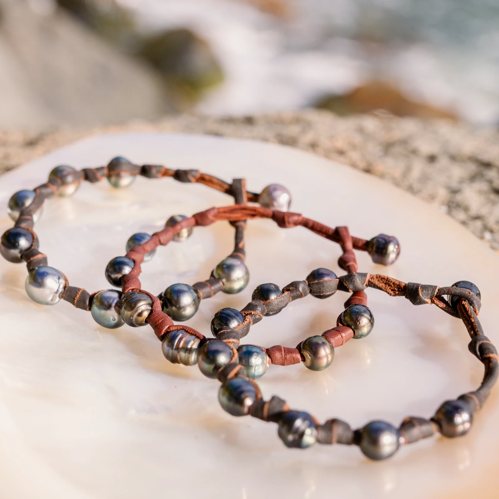Unisex Leather Bracelet with Tahitian Pearls and Knots, jewelry view.