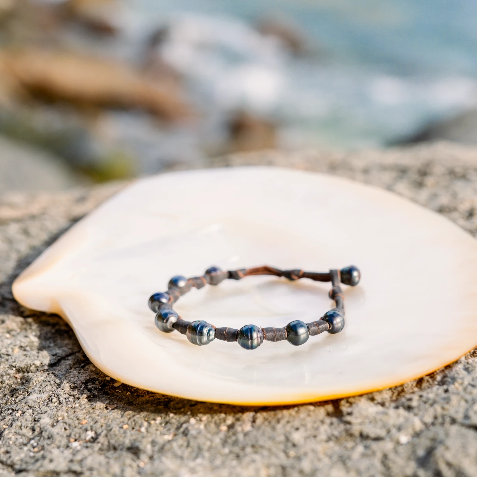 Unisex Leather Bracelet with Tahitian Pearls and Knots, jewelry view.