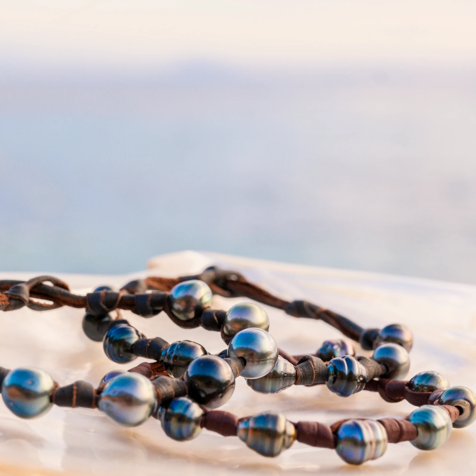 Unisex Leather Bracelet with Tahitian Pearls and Knots, jewelry view.