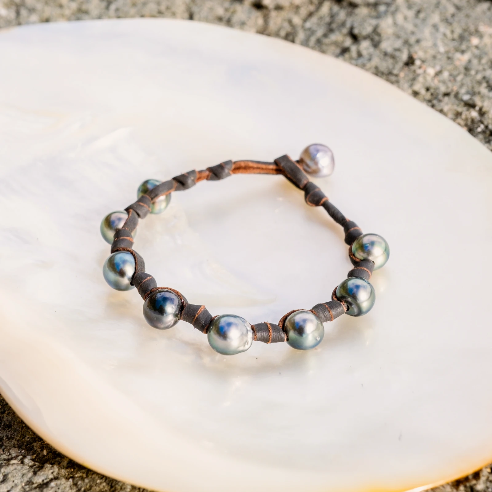 Unisex Leather Bracelet with Tahitian Pearls and Knots, jewelry view.