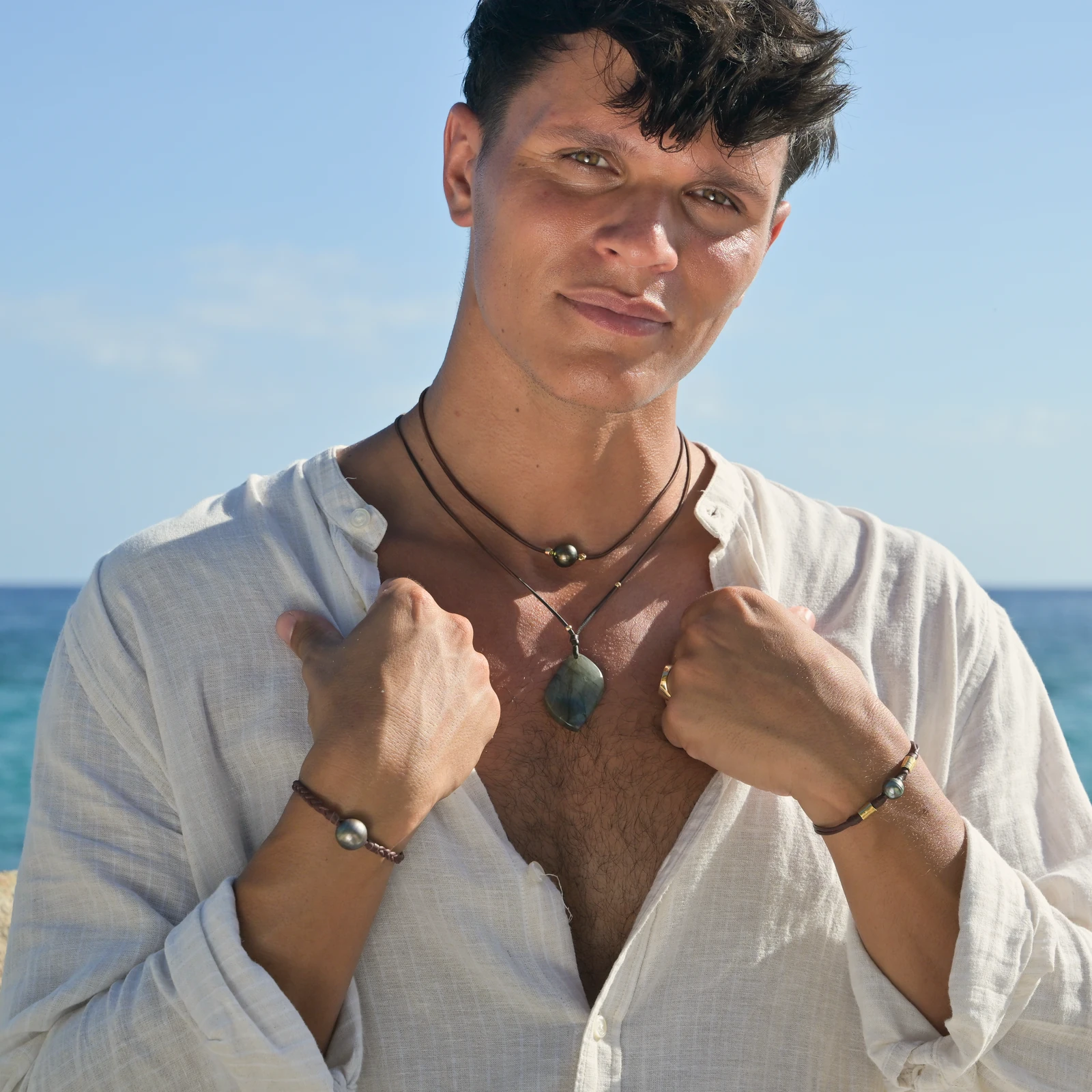 Leather Bracelet with Tahitian Pearls and a Choice of Construction, worn on the wrist.
