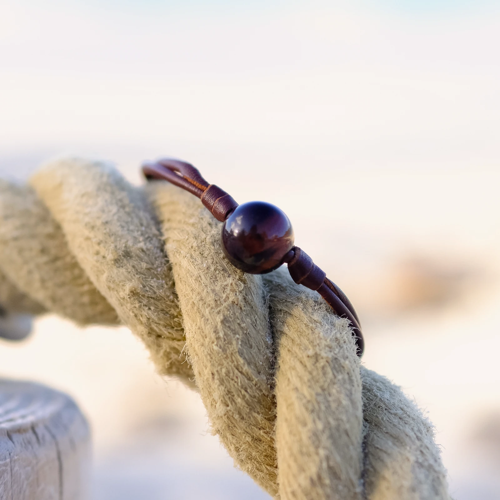 Leather Bracelet with Tiger’s Eye and a Choice of Clasp Pearl, jewelry view.