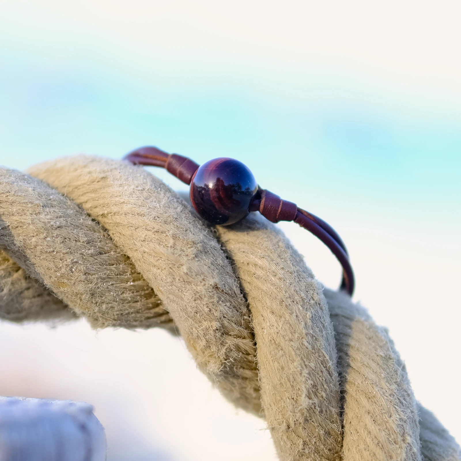 Leather Bracelet with Tiger’s Eye and a Choice of Clasp Pearl, jewelry view.