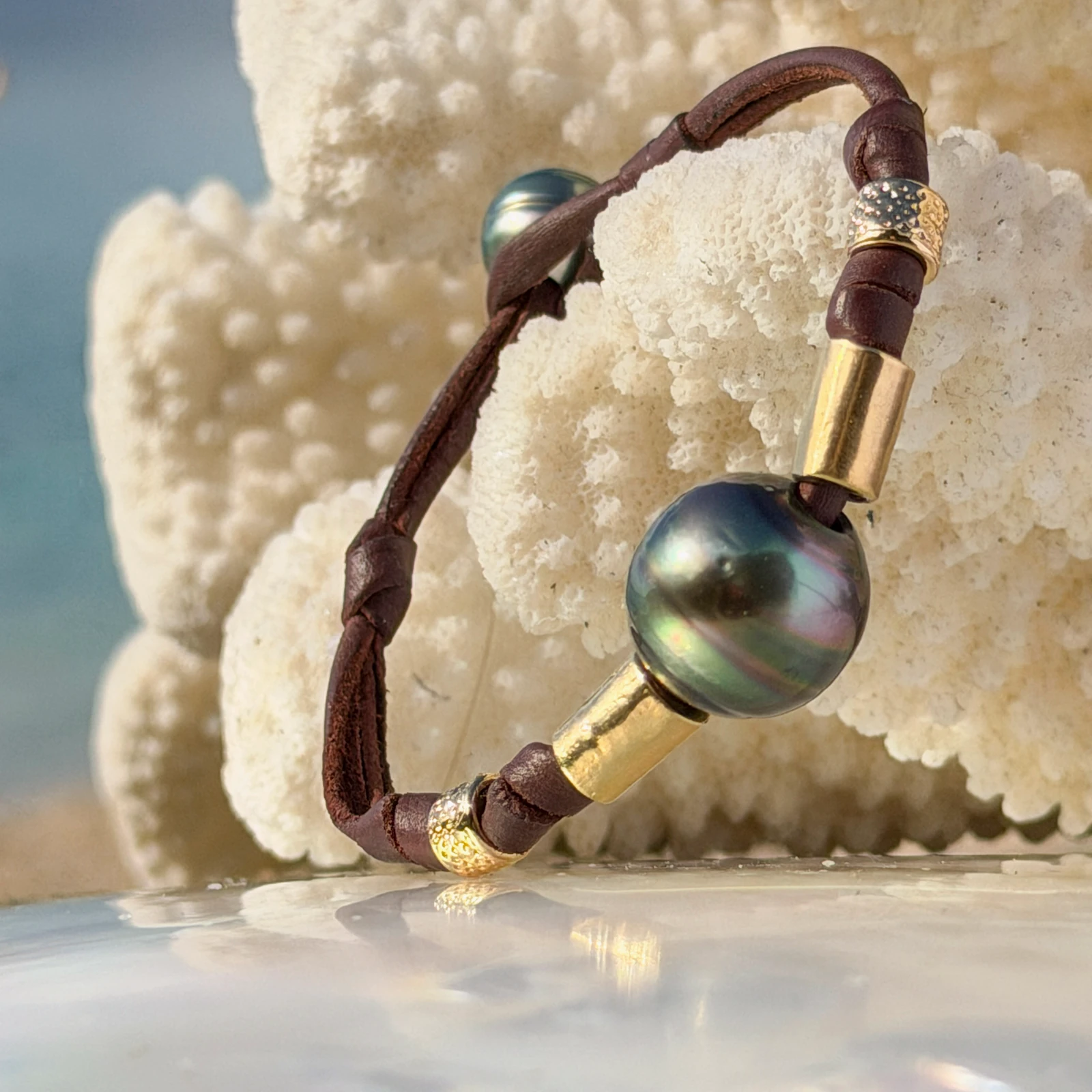 Unisex Bracelet with a Tahitian Pearl and Golden Details, jewelry view.