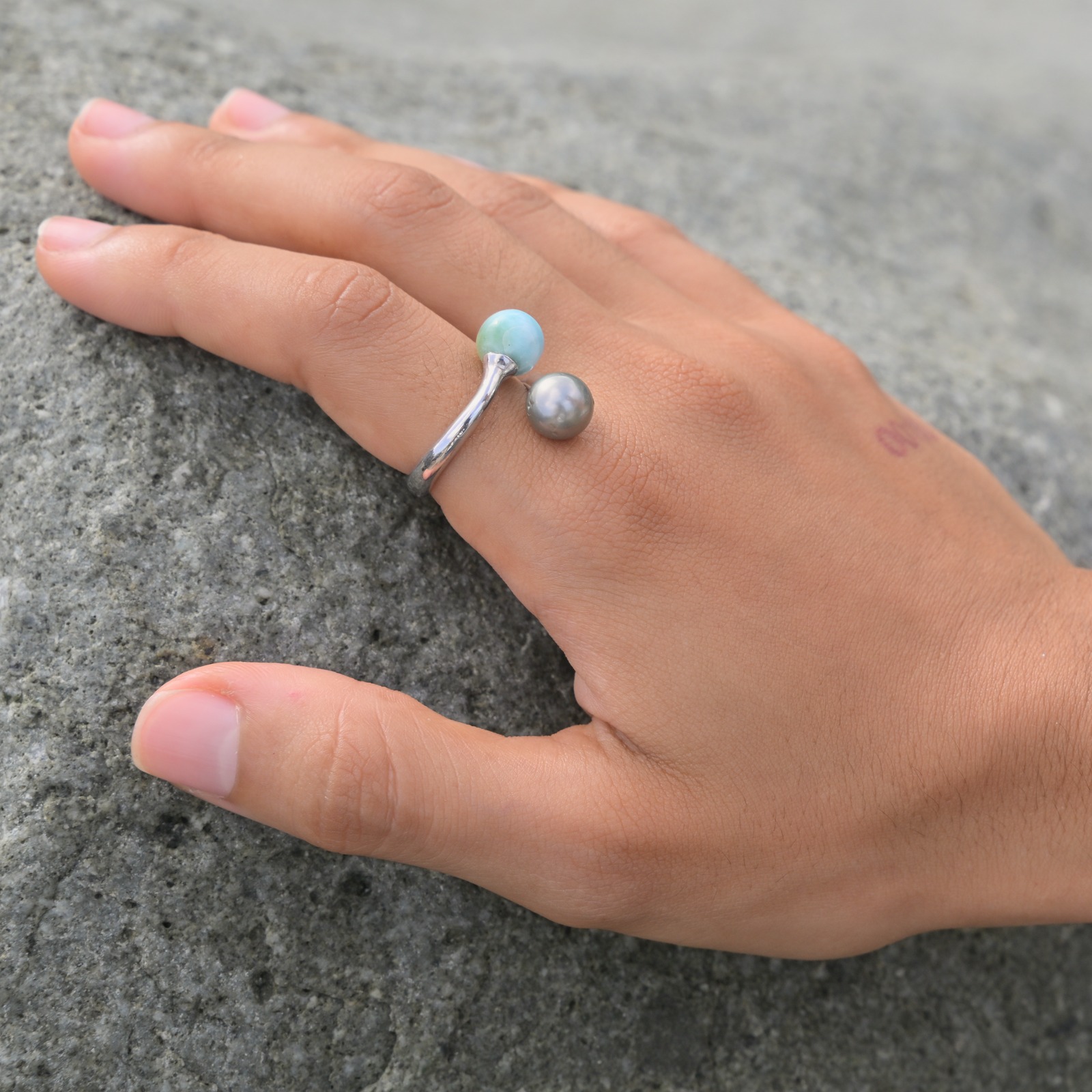 Toi et Moi silver ring with Larimar and a Tahitian pearl, worn on the hand