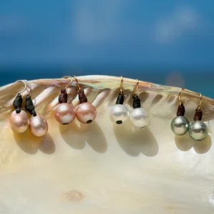 Classic leather earrings with cultured pearls, jewelry presentation