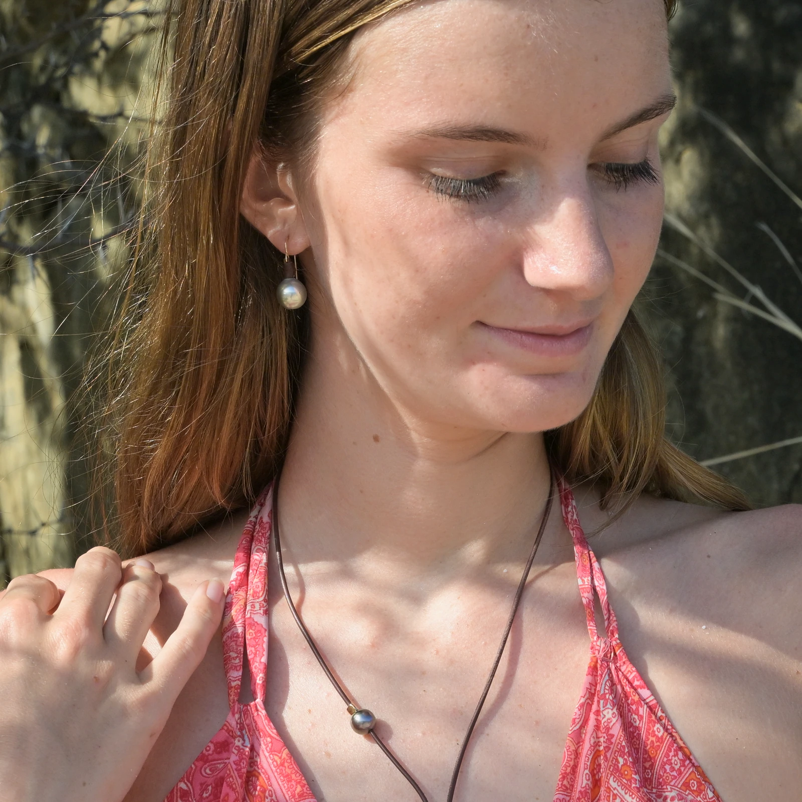 Classic leather earrings with cultured pearls, jewelry presentation