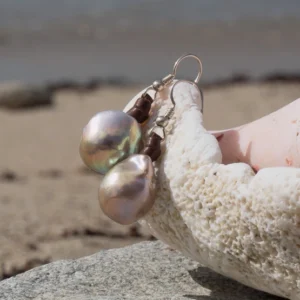 Leather earrings with large pink freshwater pearls, jewelry presentation
