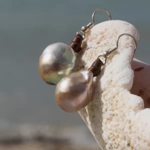 Leather earrings with large pink freshwater pearls, jewelry presentation