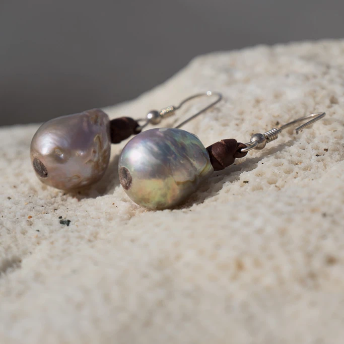 Leather earrings with large pink freshwater pearls, jewelry presentation