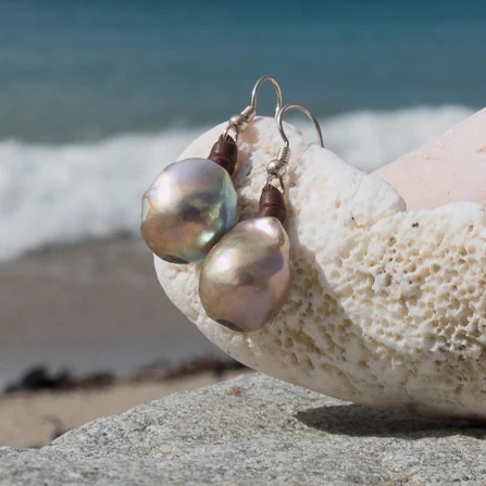 Leather earrings with large pink freshwater pearls, jewelry presentation