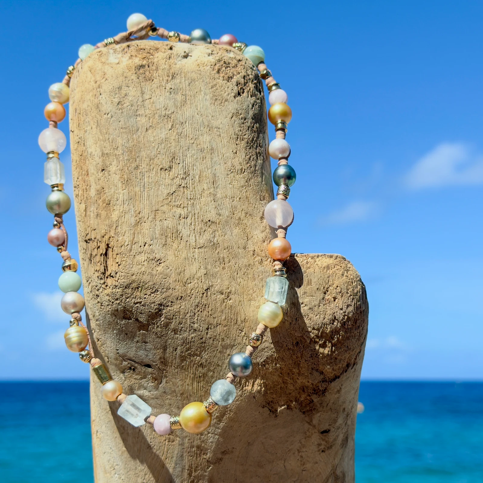 Light multicolored pearl and gemstone choker, still-life view