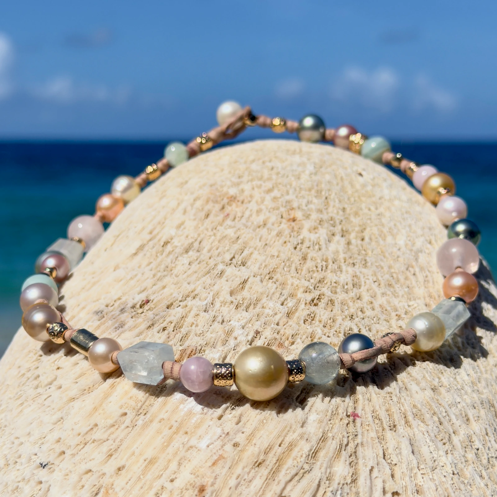 Light multicolored pearl and gemstone choker, still-life view