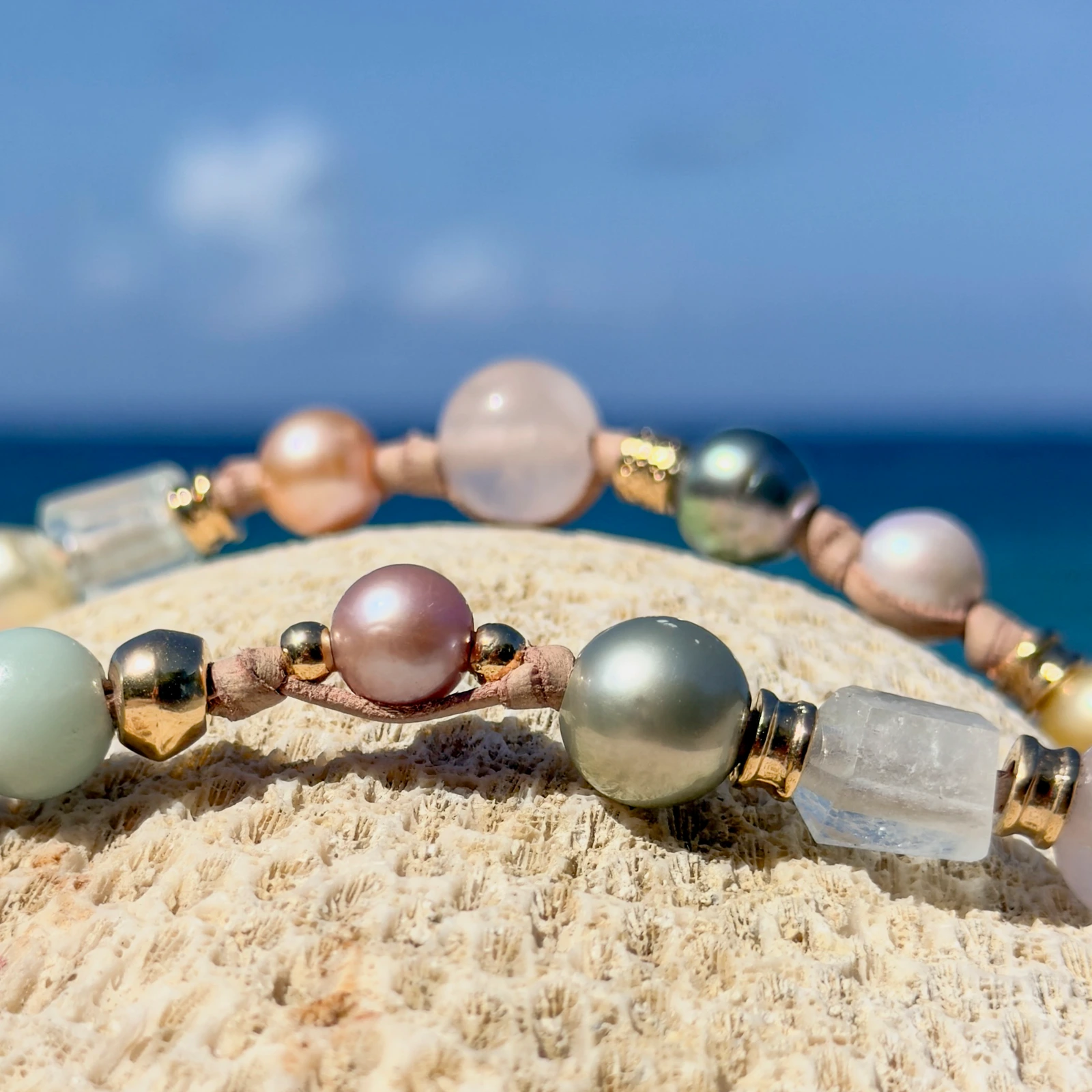 Light multicolored pearl and gemstone choker, still-life view