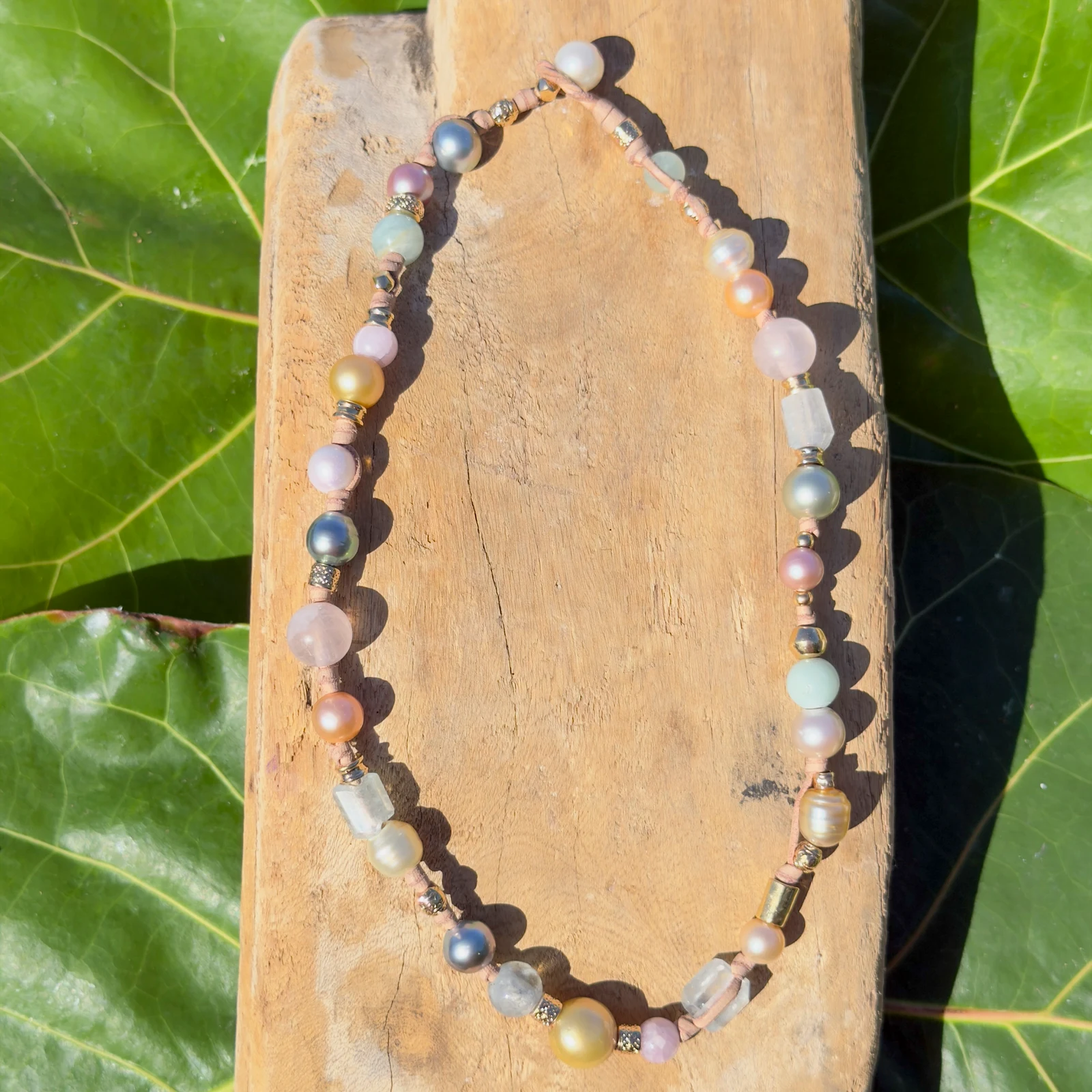 Light multicolored pearl and gemstone choker, still-life view
