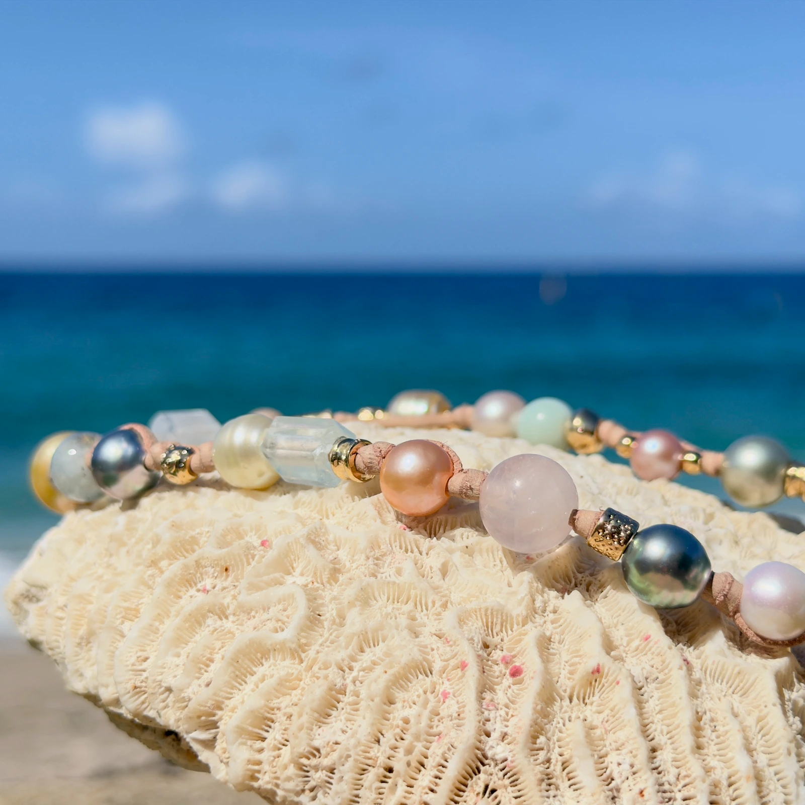 Light multicolored pearl and gemstone choker, still-life view