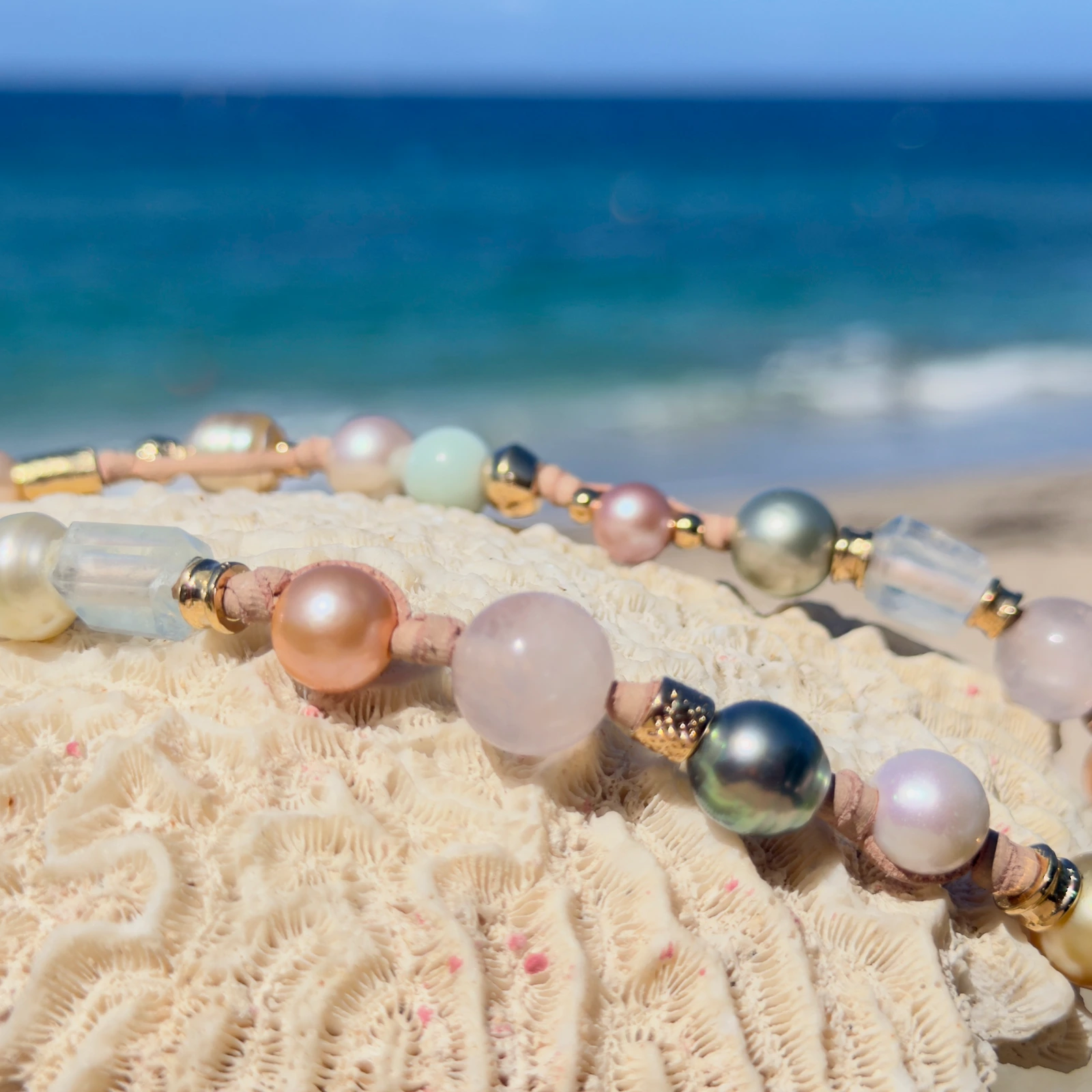 Light multicolored pearl and gemstone choker, still-life view