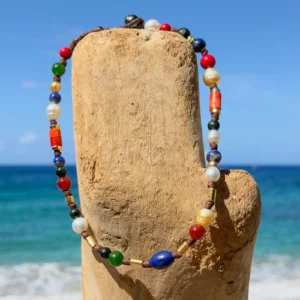 Dark multicolored pearl and gemstone choker, still-life view