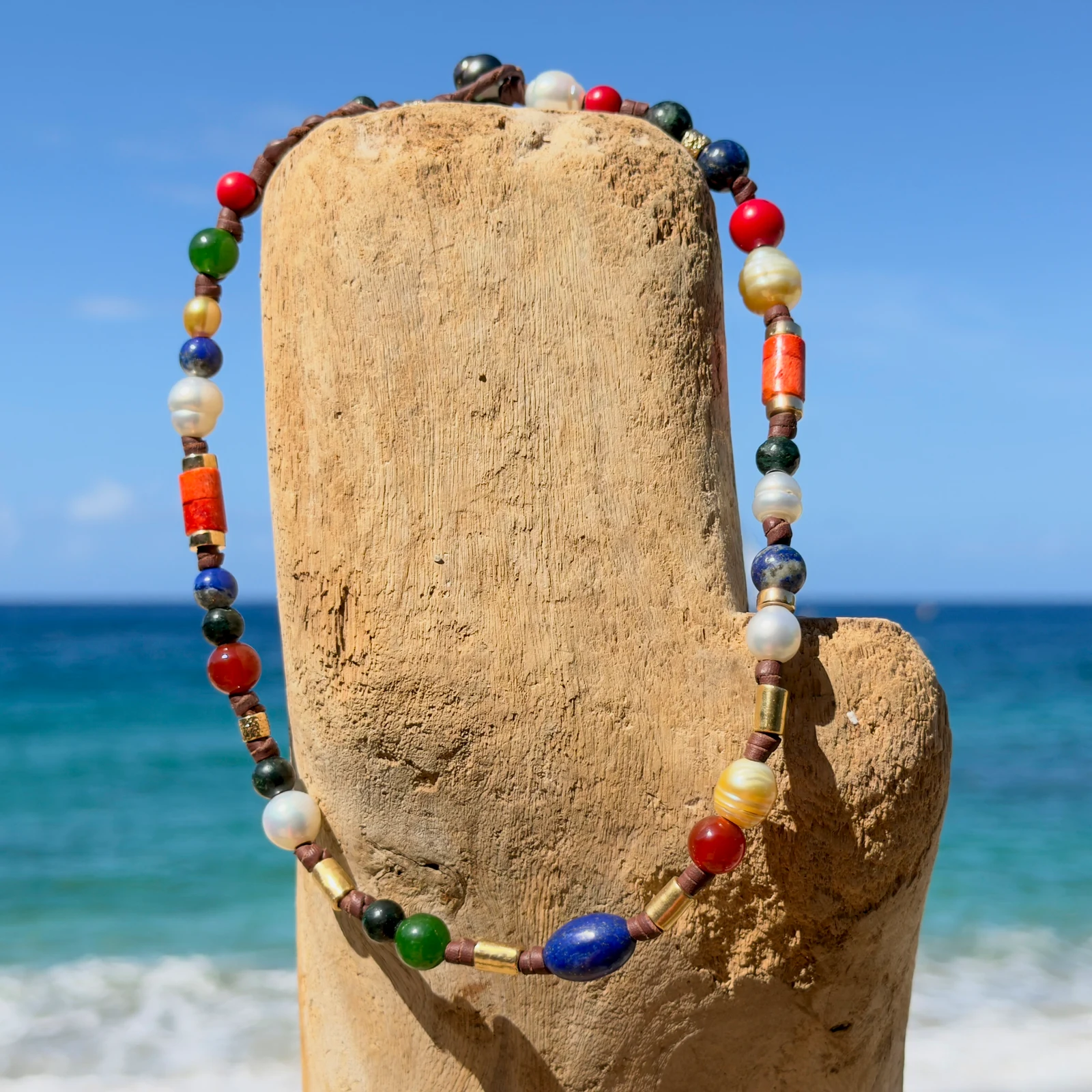 Dark multicolored pearl and gemstone choker, still-life view