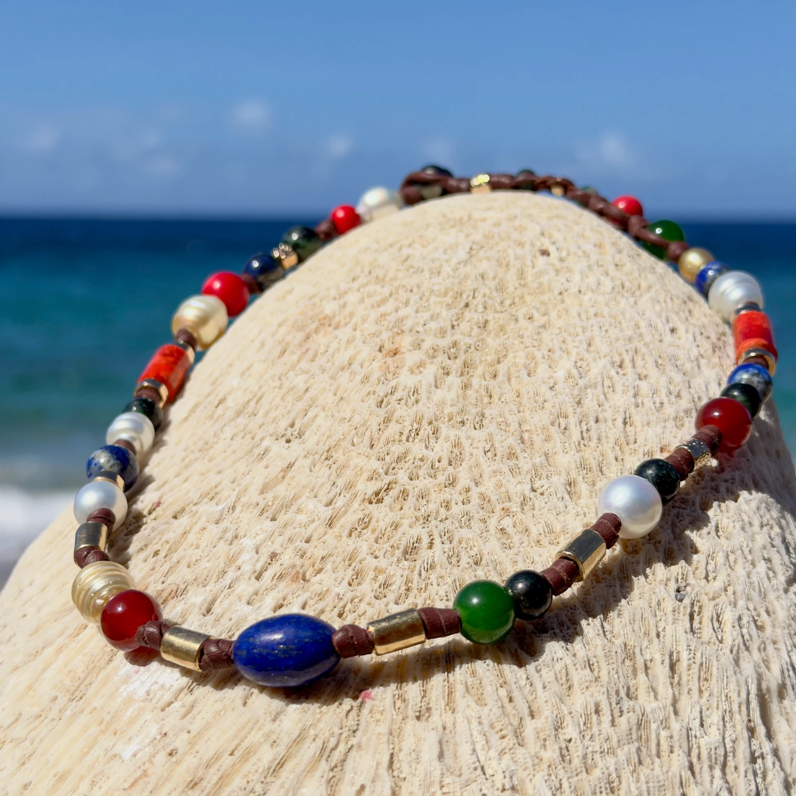 Dark multicolored pearl and gemstone choker, still-life view