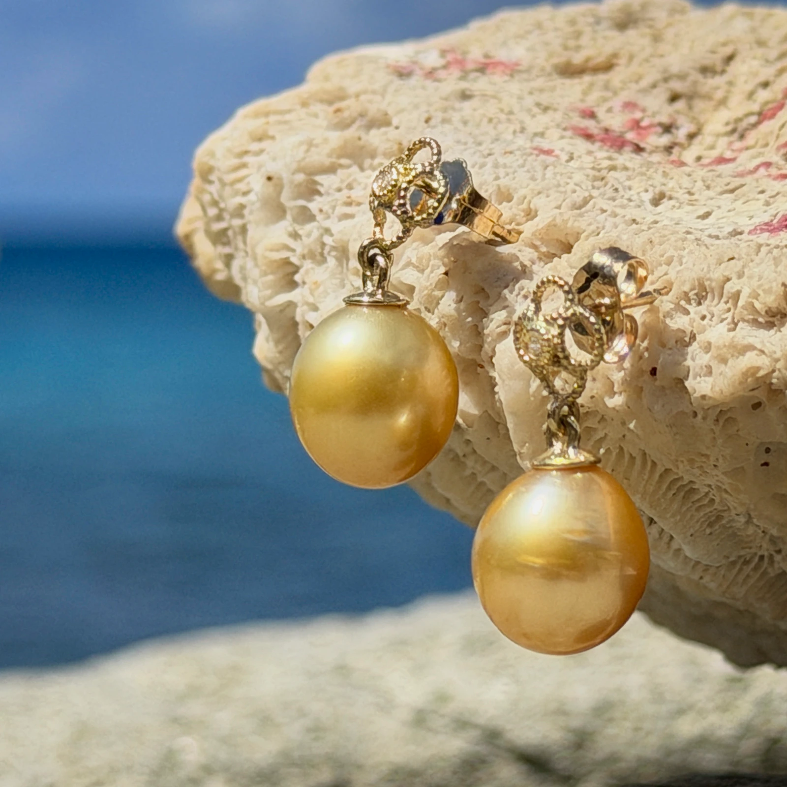 Gold Flower earrings with diamonds and a choice of pearls, still-life view